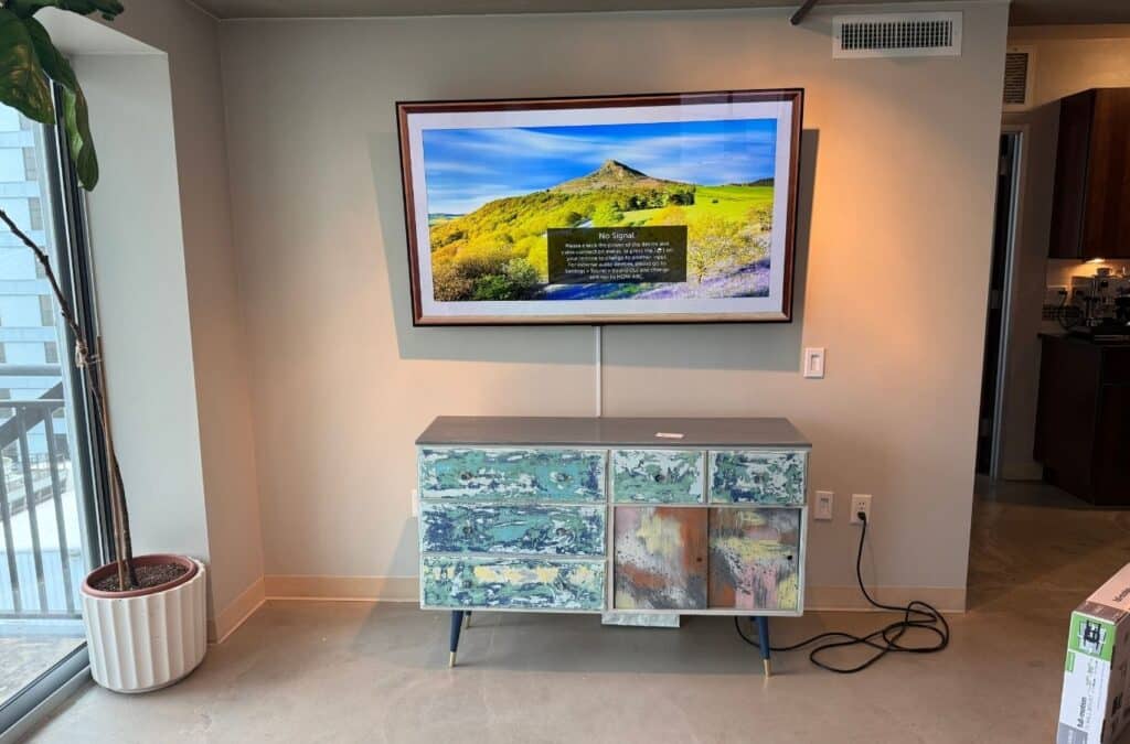 Mount It ATX expert performing mounting services in Brentwood, TX, highlighting skilled workmanship and reliable local service. Mounting Company near me.